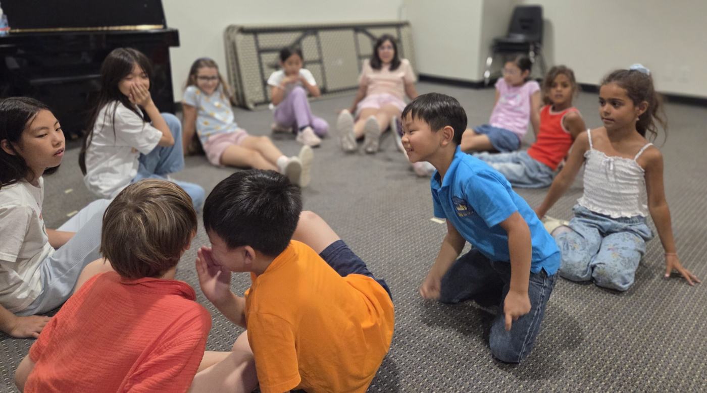 Elementary students in a group class at Olsen Academy